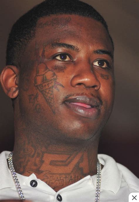 lawyer with gucci tattoo on face